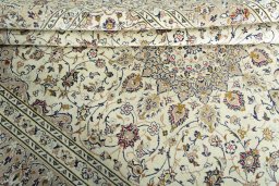 Close-up detail of 2000s Kashan rug from Iran / Persia showing Wool weave