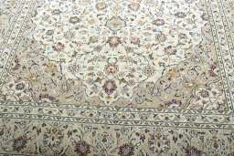 Close-up detail of 2000s Kashan rug from Iran / Persia showing Wool weave