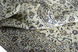 Surface texture of New Kashan rug with natural Wool and intricate pattern
