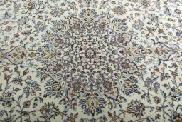 Central medallion detail of 2000s Kashan rug from Iran / Persia