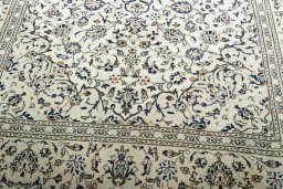 Close-up detail of 2000s Kashan rug from Iran / Persia showing Wool weave