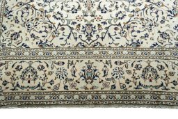 Full view of 2000s Kashan rug from Iran / Persia, 337 × 245 cm in Beige tones