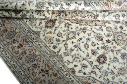 Close-up detail of 2000s Kashan rug from Iran / Persia showing Wool weave