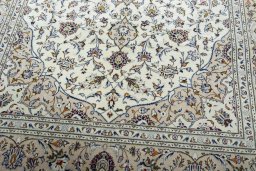 Close-up detail of 2000s Kashan rug from Iran / Persia showing Wool weave