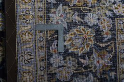 Central medallion detail of 2000s Kashan rug from Iran / Persia