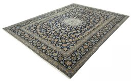 Corner detail of 2000s Kashan rug showing border pattern and Wool pile