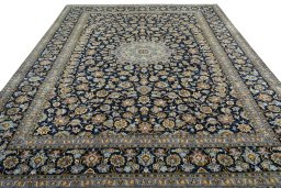 Surface texture of 2000s Kashan rug with natural Wool and intricate pattern