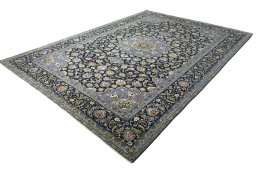 Corner detail of New Kashan rug showing border pattern and Wool pile