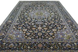 Surface texture of New Kashan rug with natural Wool and intricate pattern