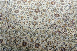 Close-up detail of 2000s Kashan rug from Iran / Persia showing Wool weave