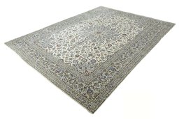 Corner detail of New Kashan rug showing border pattern and Wool pile