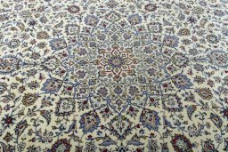 Central medallion detail of New Kashan rug from Iran / Persia