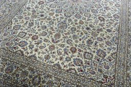 Close-up detail of New Kashan rug from Iran / Persia showing Wool weave