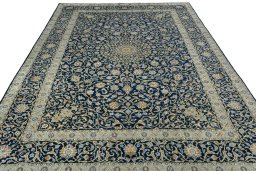 Surface texture of 2000s Kashan rug with natural Wool and intricate pattern