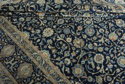 Close-up detail of 2000s Kashan rug from Iran / Persia showing Wool weave