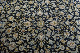 Central medallion detail of 2000s Kashan rug from Iran / Persia