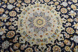 Central medallion detail of 2000s Kashan rug from Iran / Persia