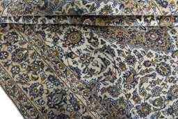 Close-up detail of 2000s Kashan rug from Iran / Persia showing Cork weave