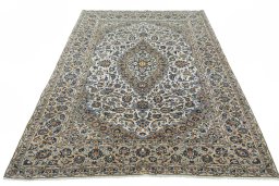 Surface texture of 2000s Kashan rug with natural Cork and intricate pattern