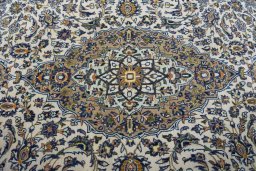 Central medallion detail of 2000s Kashan rug from Iran / Persia