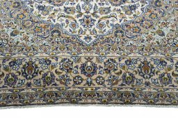 Full view of 2000s Kashan rug from Iran / Persia, 285 × 205 cm in Beige tones