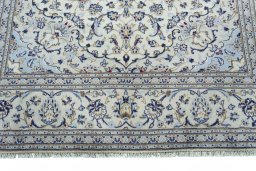 Close-up detail of 2000s Kashan rug from Iran / Persia showing Wool weave