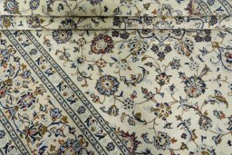 Close-up detail of 2000s Kashan rug from Iran / Persia showing Wool weave