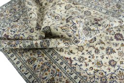 Surface texture of 2000s Kashan rug with natural Wool and intricate pattern