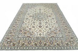 Surface texture of 2000s Kashan rug with natural Wool and intricate pattern