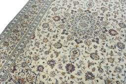 Backside of handmade 2000s Kashan rug showing knot structure and weave density