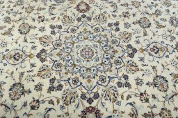 Central medallion detail of 2000s Kashan rug from Iran / Persia