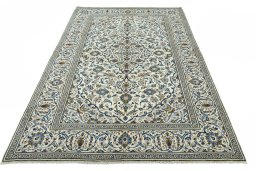 Surface texture of 2000s Kashan rug with natural Wool and intricate pattern