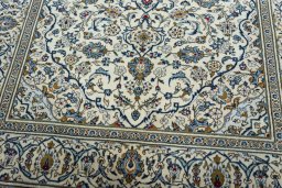Close-up detail of 2000s Kashan rug from Iran / Persia showing Wool weave