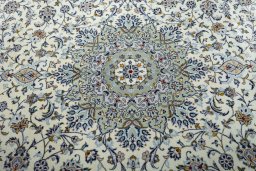Central medallion detail of 2000s Kashan rug from Iran / Persia