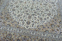 Close-up detail of 2000s Kashan rug from Iran / Persia showing Wool weave