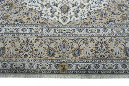 Full view of 2000s Kashan rug from Iran / Persia, 397 × 292 cm in Beige tones
