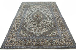 Surface texture of 2000s Kashan rug with natural Wool and intricate pattern