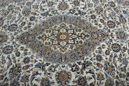 Central medallion detail of 2000s Kashan rug from Iran / Persia
