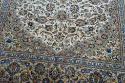 Close-up detail of 2000s Kashan rug from Iran / Persia showing Wool weave