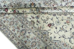 Close-up detail of New Kashan rug from Iran / Persia showing Wool weave