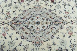 Central medallion detail of New Kashan rug from Iran / Persia