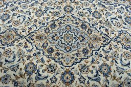 Central medallion detail of 2000s Kashan rug from Iran / Persia