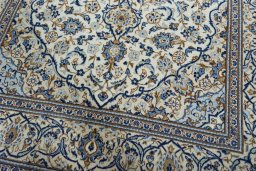 Close-up detail of 2000s Kashan rug from Iran / Persia showing Wool weave