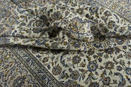 Surface texture of 2000s Kashan rug with natural Wool and intricate pattern