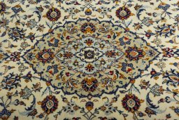 Central medallion detail of 2000s Kashan rug from Iran / Persia