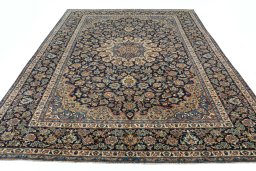 Surface texture of 2000s Kashan rug with natural Wool and intricate pattern