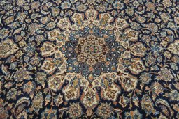 Central medallion detail of 2000s Kashan rug from Iran / Persia