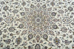 Central medallion detail of 2000s Kashan rug from Iran / Persia