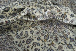 Surface texture of 2000s Kashan rug with natural Wool and intricate pattern
