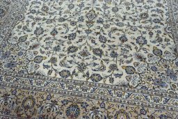 Close-up detail of 2000s Kashan rug from Iran / Persia showing Wool weave